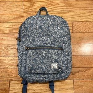 Blue Herschel backpack with floral print